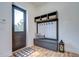 Mudroom with storage and seating at 111 Alafia Estates Ln, Plant City, FL 33567