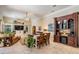 Spacious living room with a large bookcase and comfortable seating at 15810 Stanton Ln, Tampa, FL 33647