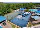Aerial shot of community basketball court and water slide, offering fun recreational activities at 1626 Brooksbend Dr, Wesley Chapel, FL 33543