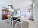 Open dining room with stylish furniture, elegant decor, and seamless flow into other living spaces at 1626 Brooksbend Dr, Wesley Chapel, FL 33543