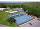A top-down view of the community's tennis and pickleball courts showcases recreational amenities at 1626 Brooksbend Dr, Wesley Chapel, FL 33543