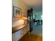 Inviting hallway featuring a grandfather clock and decorative furnishings at 1679 S Lake Ave # 4, Clearwater, FL 33756