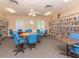 Well-stocked library with tables and chairs for reading at 1679 S Lake Ave # 4, Clearwater, FL 33756