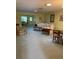 Spacious living room with neutral carpet, natural light, and comfortable seating arrangement at 1679 S Lake Ave # 4, Clearwater, FL 33756