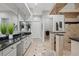 Bathroom features granite countertops, built-in shelves, and a luxurious shower at 17062 Comunidad De Avila, Lutz, FL 33548