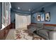Enjoy movies in this home theater with a projector, large screen, comfortable seating, and cool decor at 17062 Comunidad De Avila, Lutz, FL 33548
