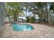 Backyard pool area with outdoor seating and landscaping at 17062 Comunidad De Avila, Lutz, FL 33548