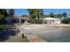 Waterfront property featuring a private beach and dock for boating and enjoying coastal living at 175 Bath Club N Blvd, North Redington Beach, FL 33708