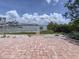 Picturesque waterfront view with a private dock, offering relaxation and water activities at 175 Bath Club N Blvd, North Redington Beach, FL 33708