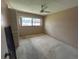 Bedroom with a ceiling fan and natural light coming through the window at 1845 S Highland Ave # 6-11, Largo, FL 33756