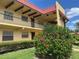 Charming multi-story building with manicured landscaping and inviting entrances at 1845 S Highland Ave # 6-11, Largo, FL 33756