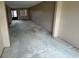 Spacious living room features neutral walls and carpet, waiting for your personal touch at 1845 S Highland Ave # 6-11, Largo, FL 33756