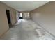 Open living room features neutral walls, a window, and ample space for flexible layouts at 1845 S Highland Ave # 6-11, Largo, FL 33756