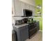 Bright kitchen featuring stainless steel appliances, granite countertops, and ample cabinet space at 18607 Bent Pine Dr, Hudson, FL 34667