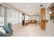 Bright sunroom featuring lots of windows, built-in seating, and an easy access to outdoor pool at 1874 Cameo Way, Clearwater, FL 33756