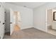 Spacious bedroom with multiple doors and neutral carpet at 2121 1St N Ave, St Petersburg, FL 33713