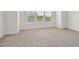 Large bedroom features wood floors, neutral paint, and large windows for natural light at 2121 1St N Ave, St Petersburg, FL 33713