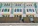 Charming townhome featuring a modern design and gated front yards for added privacy and curb appeal at 2121 1St N Ave, St Petersburg, FL 33713