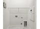 Practical laundry room offering storage and a utility sink at 2121 1St N Ave, St Petersburg, FL 33713