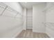 Spacious walk-in closet offering ample storage with wire shelving and neutral carpet at 2121 1St N Ave, St Petersburg, FL 33713