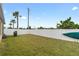 Large backyard with a privacy fence, lush grass, and room for outdoor activities at 2404 Dovesong Trace Dr, Ruskin, FL 33570