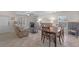 Comfortable living room with dining area, tile floors and natural light at 2404 Dovesong Trace Dr, Ruskin, FL 33570