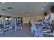 Well-equipped fitness center with treadmills, weight machines, and ample space for a complete workout at 2816 Graphite Ct, Valrico, FL 33594
