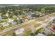 Overhead shot reveals home's placement near green spaces in a tranquil neighborhood, with easy access to community amenities at 3360 Masters Dr, Clearwater, FL 33761