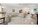 Bright living room featuring tile floors and an open layout to the dining area at 3360 Masters Dr, Clearwater, FL 33761