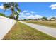A serene walking path near this property offers a quiet escape with lush greenery and open skies at 3360 Masters Dr, Clearwater, FL 33761