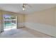 Bedroom featuring sliding glass doors with a view to the pool at 3505 Kilmer Dr, Plant City, FL 33566