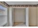 A bedroom closet with double doors is shown open, featuring a built-in shelf at the top at 3505 Kilmer Dr, Plant City, FL 33566