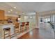 Open kitchen with granite countertops, breakfast bar, stainless appliances and ample cabinet space at 3505 Kilmer Dr, Plant City, FL 33566