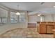 Charming kitchen with tile floors, bright windows, and stainless steel dishwasher at 3505 Kilmer Dr, Plant City, FL 33566