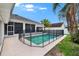 Secluded pool area with screened-in lanai offers relaxation and entertainment in your backyard at 3505 Kilmer Dr, Plant City, FL 33566