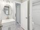 Modern bathroom featuring a stylish vanity, updated fixtures, and tiled shower at 3681 Trophy Blvd # 6, New Port Richey, FL 34655