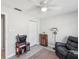 Inviting bedroom featuring a ceiling fan, closet, and classic decor at 3681 Trophy Blvd # 6, New Port Richey, FL 34655