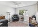 Relaxing bedroom with a ceiling fan, ample natural light, and comfortable seating at 3681 Trophy Blvd # 6, New Port Richey, FL 34655