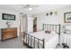 Comfortable bedroom featuring a ceiling fan, closet, and a neutral color palette at 3681 Trophy Blvd # 6, New Port Richey, FL 34655