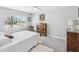 Serene bedroom with ceiling fan, ample natural light, and classic decor at 3681 Trophy Blvd # 6, New Port Richey, FL 34655