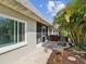 Charming home exterior featuring well-kept landscaping and a peaceful patio area at 3681 Trophy Blvd # 6, New Port Richey, FL 34655