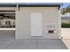 Clean exterior shot of white door with mailbox and minimal decoration at 3681 Trophy Blvd # 6, New Port Richey, FL 34655