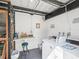 Functional laundry room featuring washer and dryer, with space for organizing supplies at 3681 Trophy Blvd # 6, New Port Richey, FL 34655