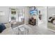 Comfortable living room with sliding glass doors, providing access to outdoor space and natural light at 3681 Trophy Blvd # 6, New Port Richey, FL 34655