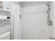 Bright, renovated shower area with subway tile, and upgraded fixtures at 3681 Trophy Blvd # 6, New Port Richey, FL 34655