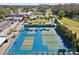 Aerial view of well-maintained tennis and pickleball courts, perfect for recreation and sports at 3681 Trophy Blvd # 6, New Port Richey, FL 34655