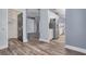 Open floor plan view of the kitchen and living area with hardwood floors at 384 Tavernier Cir, Oldsmar, FL 34677