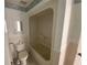 Bathroom with a toilet, vanity, and shower and bath combination at 4518 Narraganset Trl # 85A, Sarasota, FL 34233