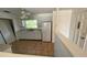 Bright, tiled kitchen featuring white appliances, ample counter space, and natural light at 4518 Narraganset Trl # 85A, Sarasota, FL 34233