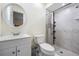 Stylish bathroom with modern fixtures, marble tile, and a glass-enclosed shower at 4568 67Th N St, St Petersburg, FL 33709